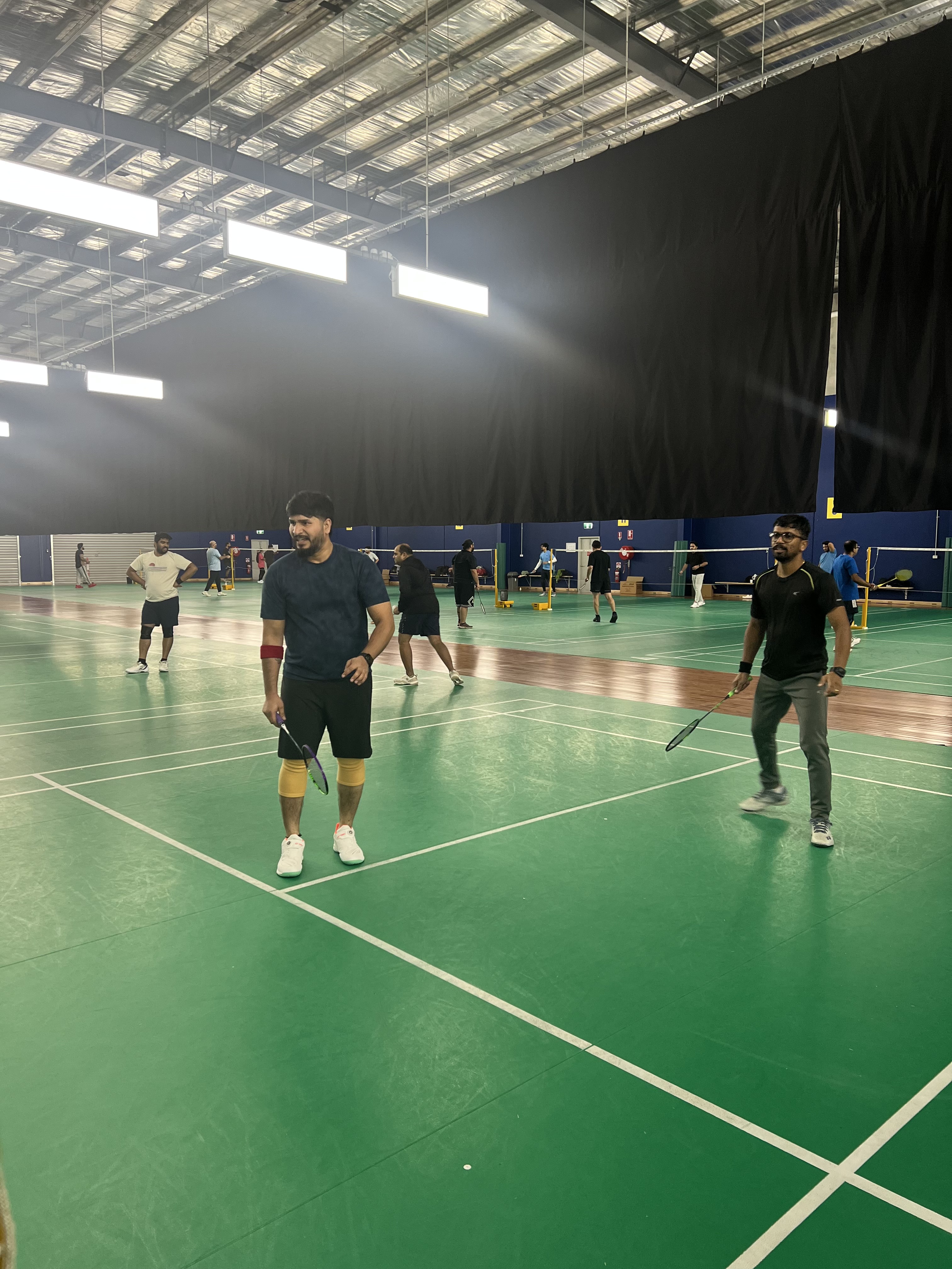 Players enjoying a Western Badminton social session