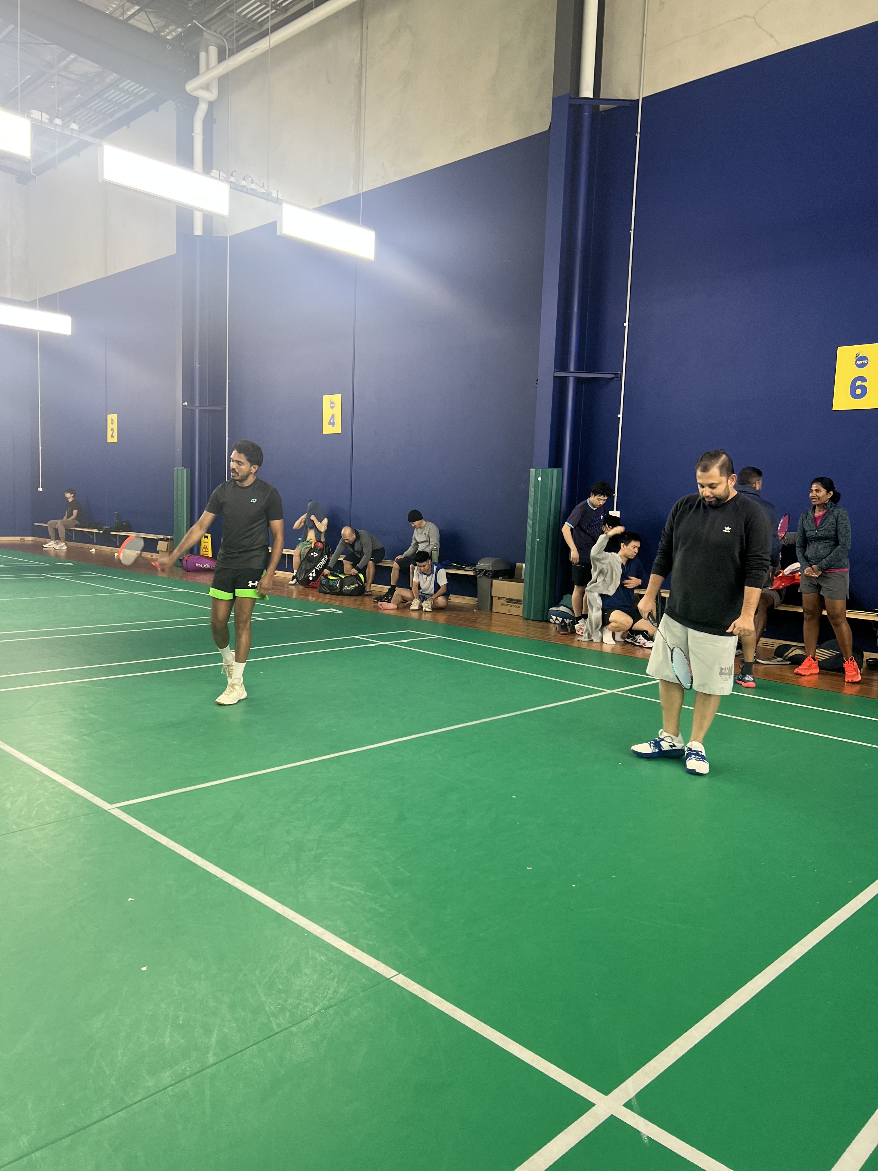 Badminton players preparing for safe play